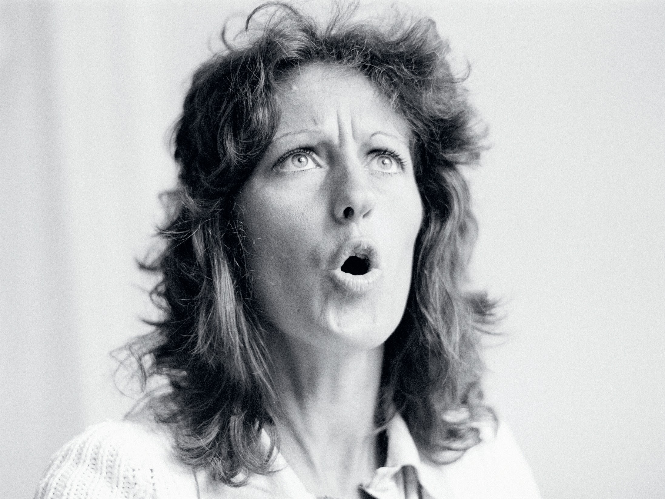 Black and white photo of Greer as a young woman.
