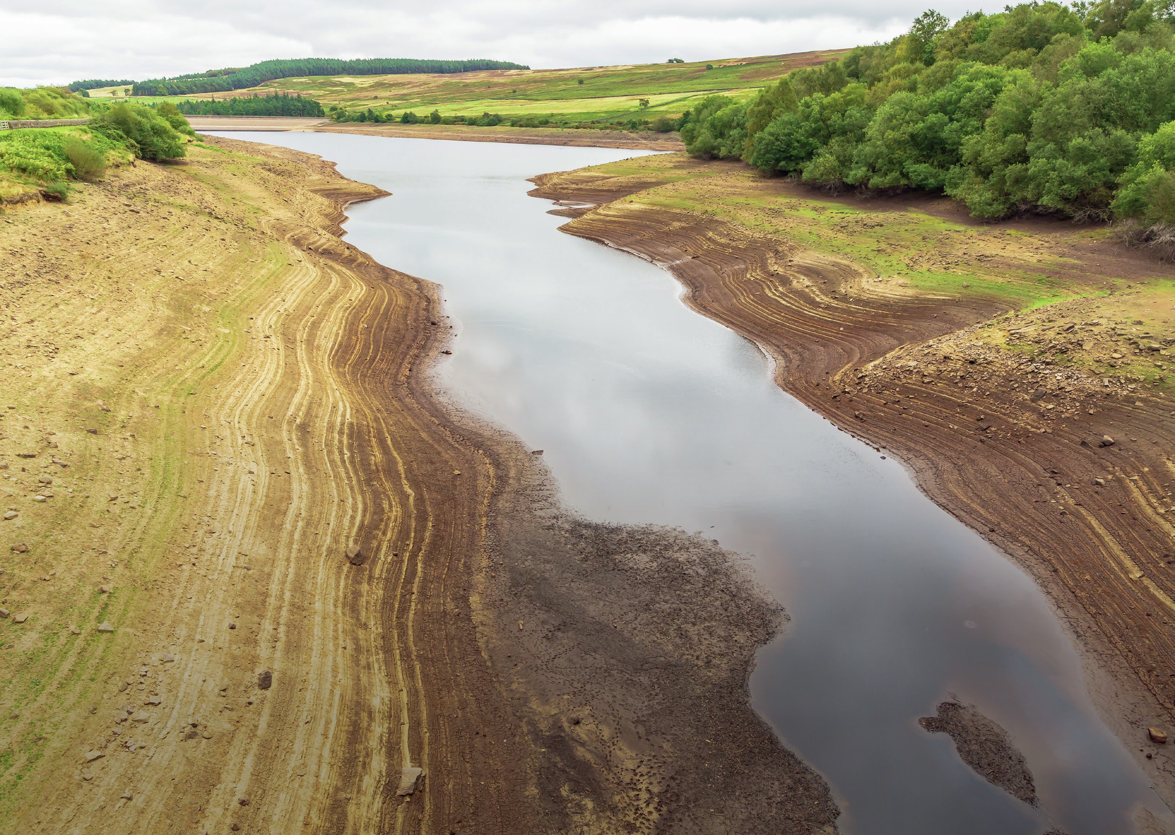 River view with deep banks, indicating low water level.