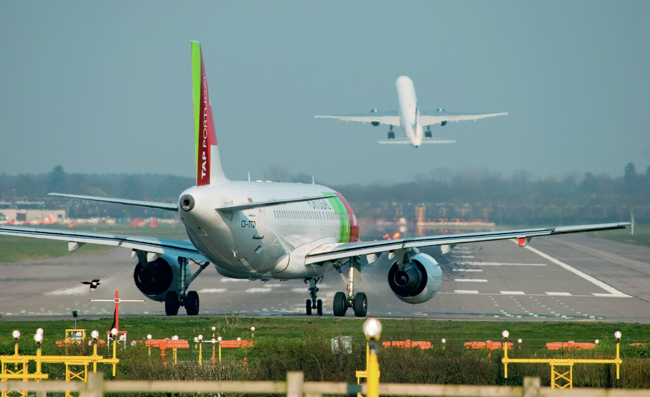 Planes on the Gatwick runway.