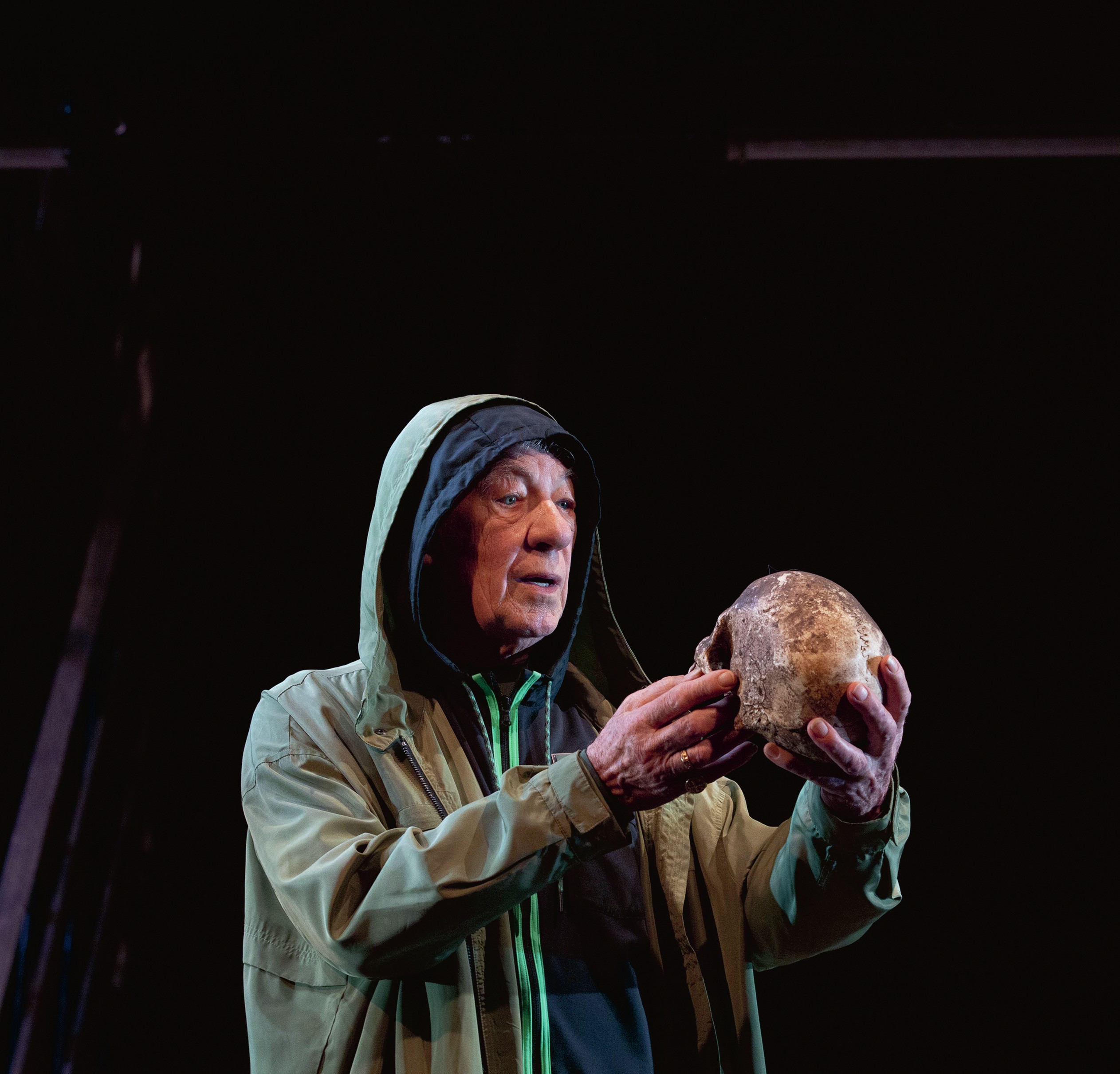 Hamlet holding a skull and talking to it.